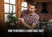 Decorated Christmas tree with lights, ribbon, and ornaments – how to decorate a Christmas tree