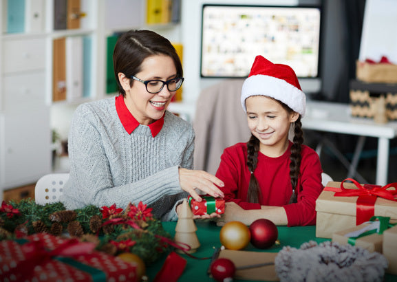 Personalized Christmas ornaments displayed on a decorated Christmas tree