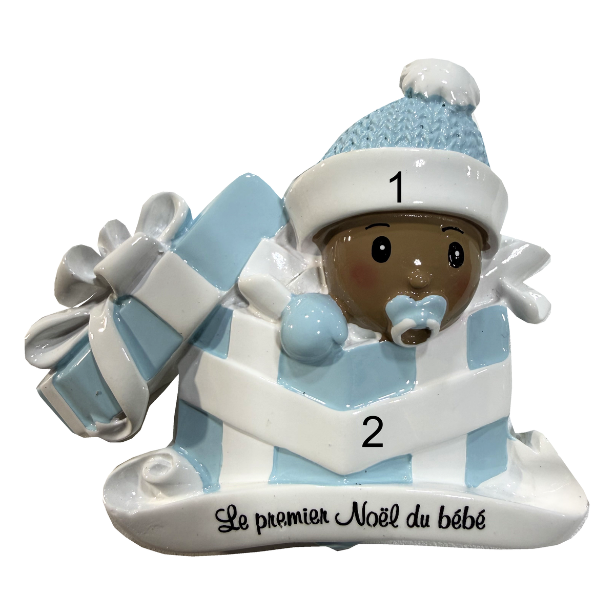 Un petit cadeau du ciel — Bébé en bleu, peau foncée