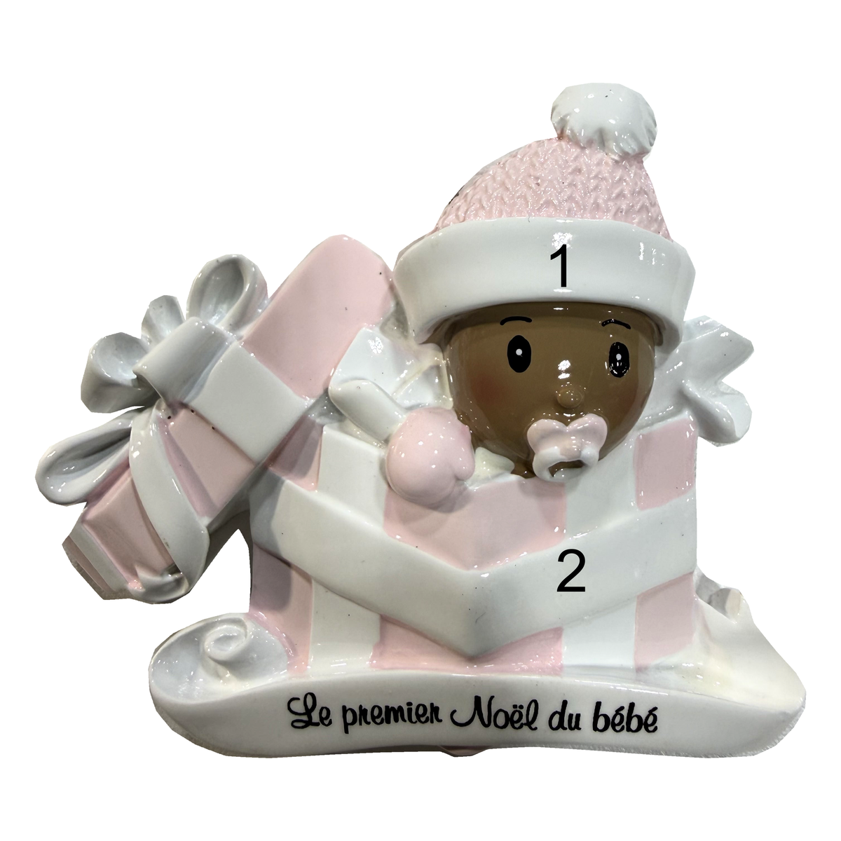 Un petit cadeau du ciel — Bébé en rose, peau foncée