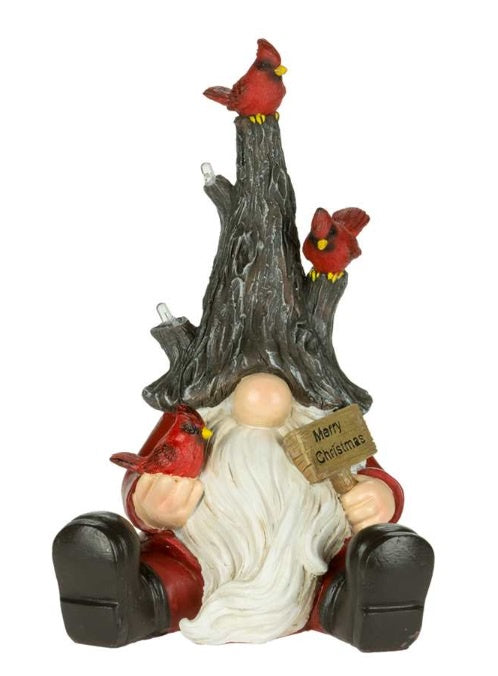 Cardinals sitting on Gnome Santa